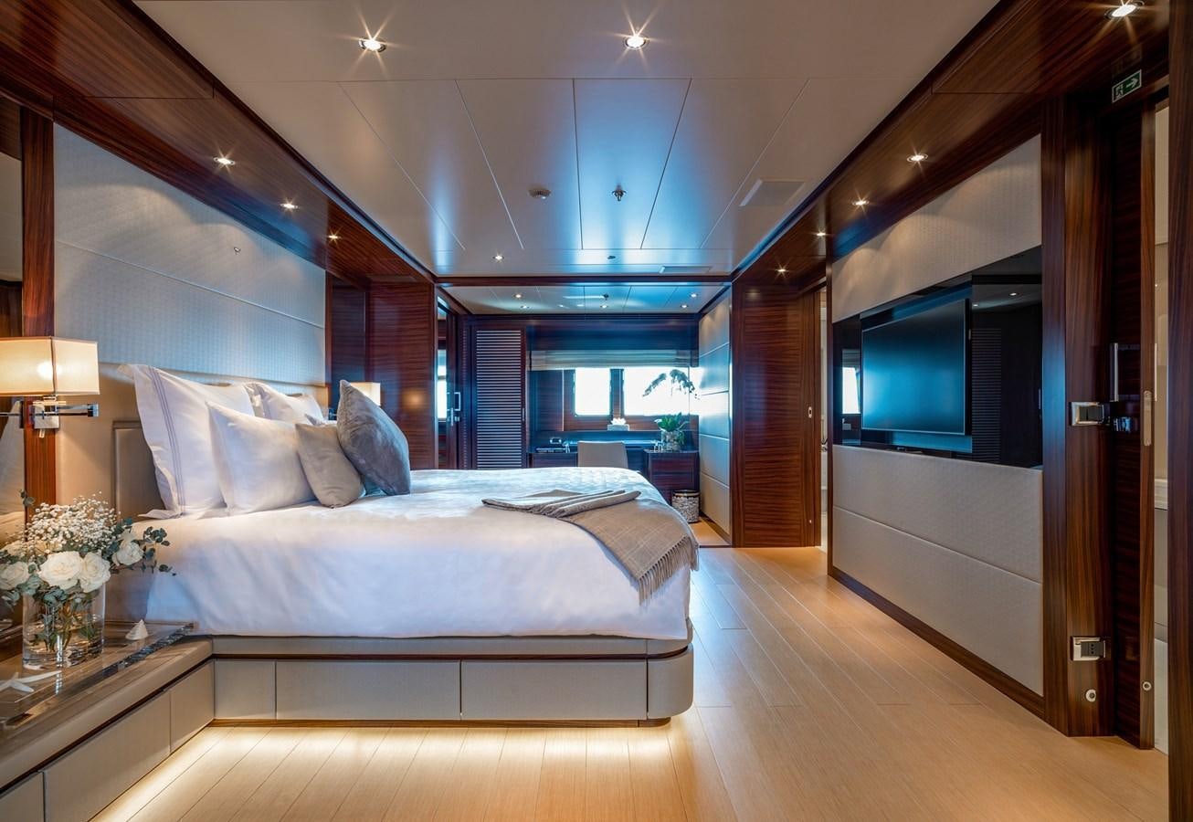 a bed in a room aboard ATLAS Yacht for Sale