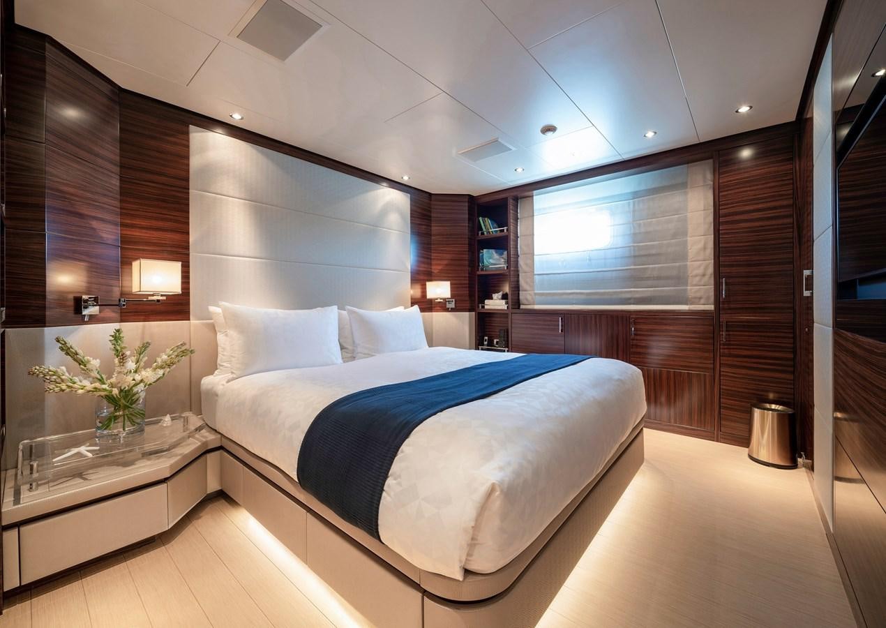 a bed in a room aboard ATLAS Yacht for Sale