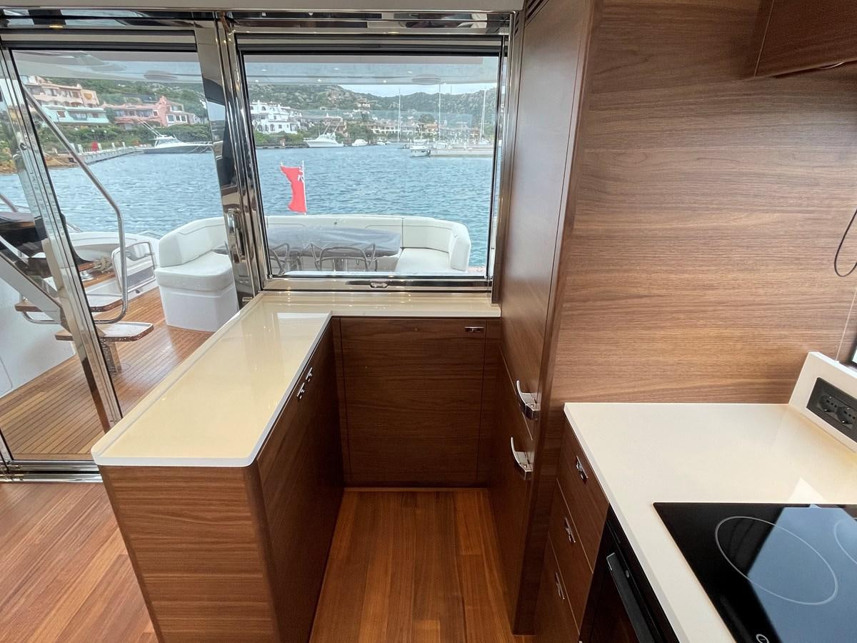 a kitchen with a view of the ocean aboard LESTO Yacht for Sale