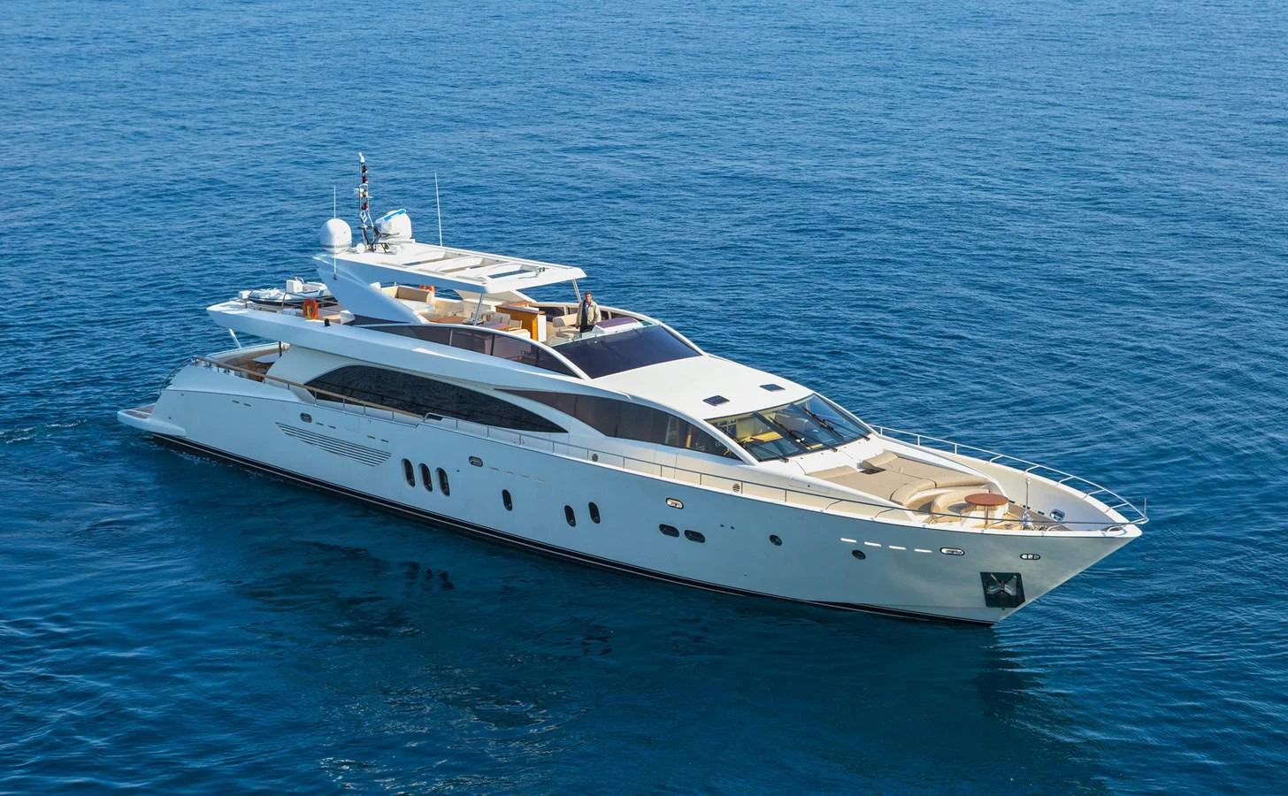 a white yacht in the water aboard WATER TOY III Yacht for Sale