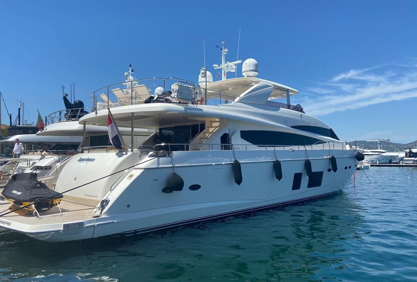 a white yacht in the water aboard EXPERIENCE Yacht for Sale