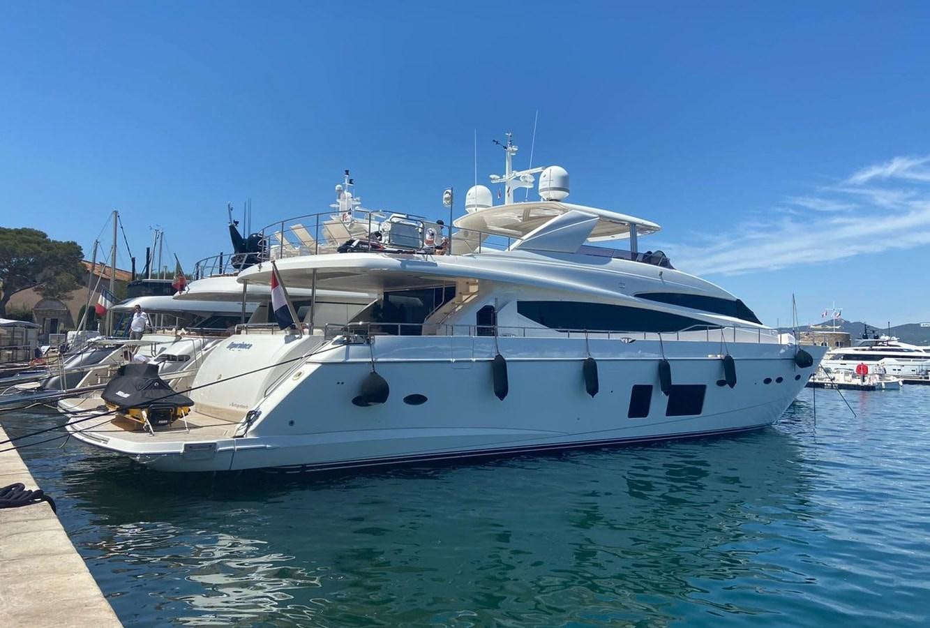 a white yacht in the water aboard EXPERIENCE Yacht for Sale