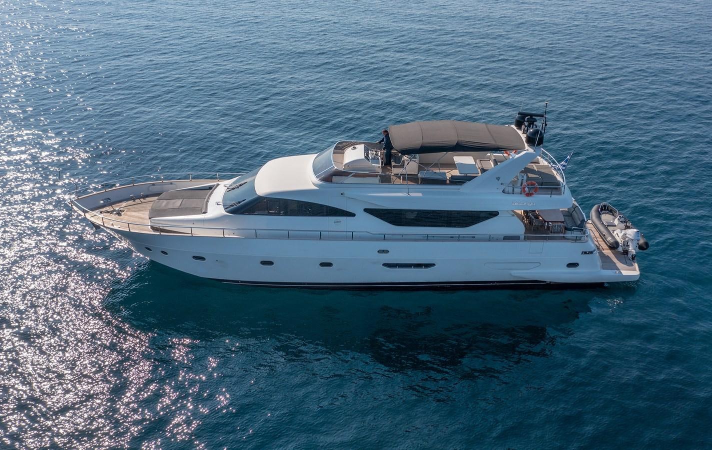 a white yacht on the water aboard SALTY Yacht for Sale