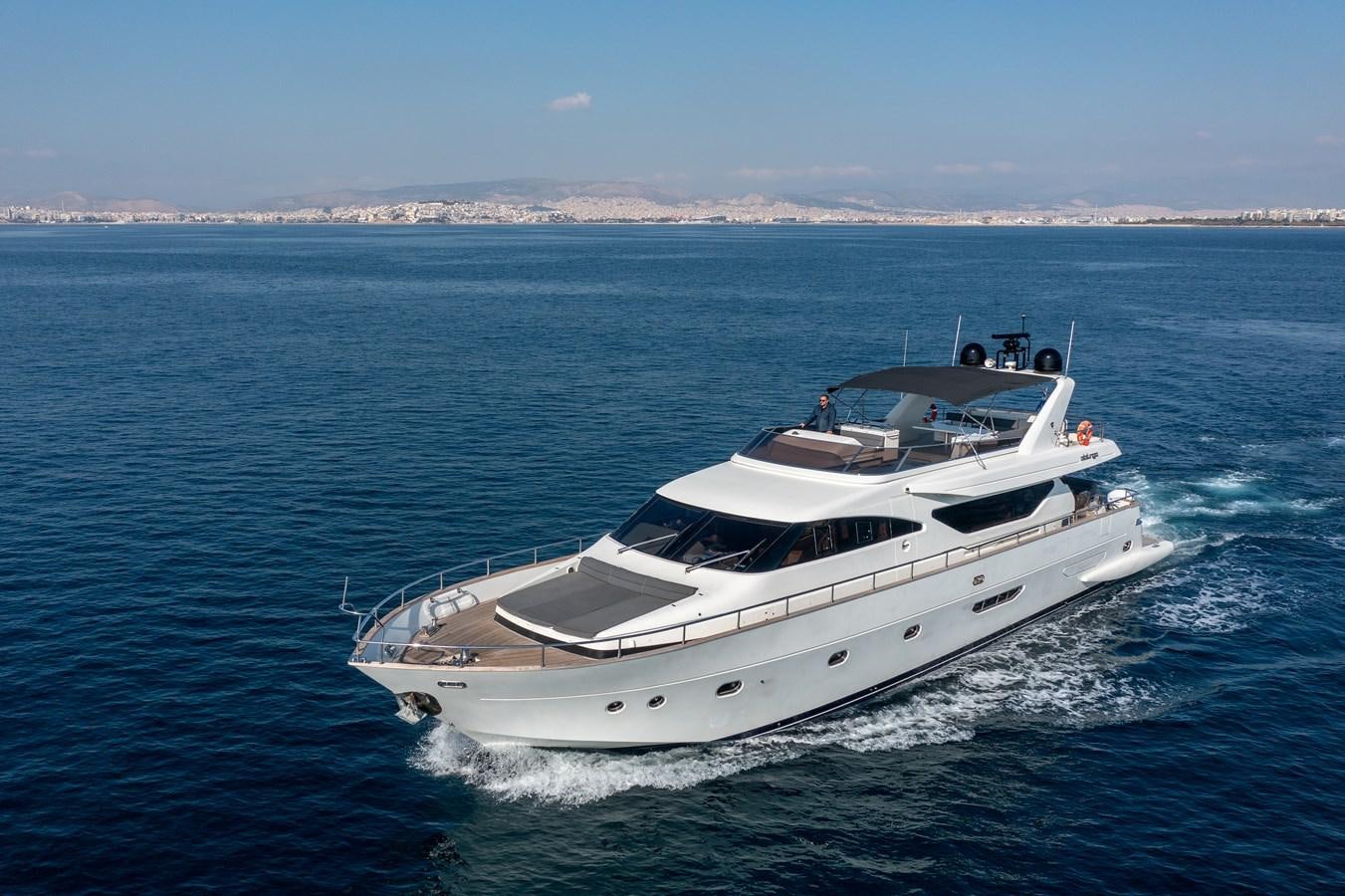 a white yacht in the water aboard SALTY Yacht for Sale