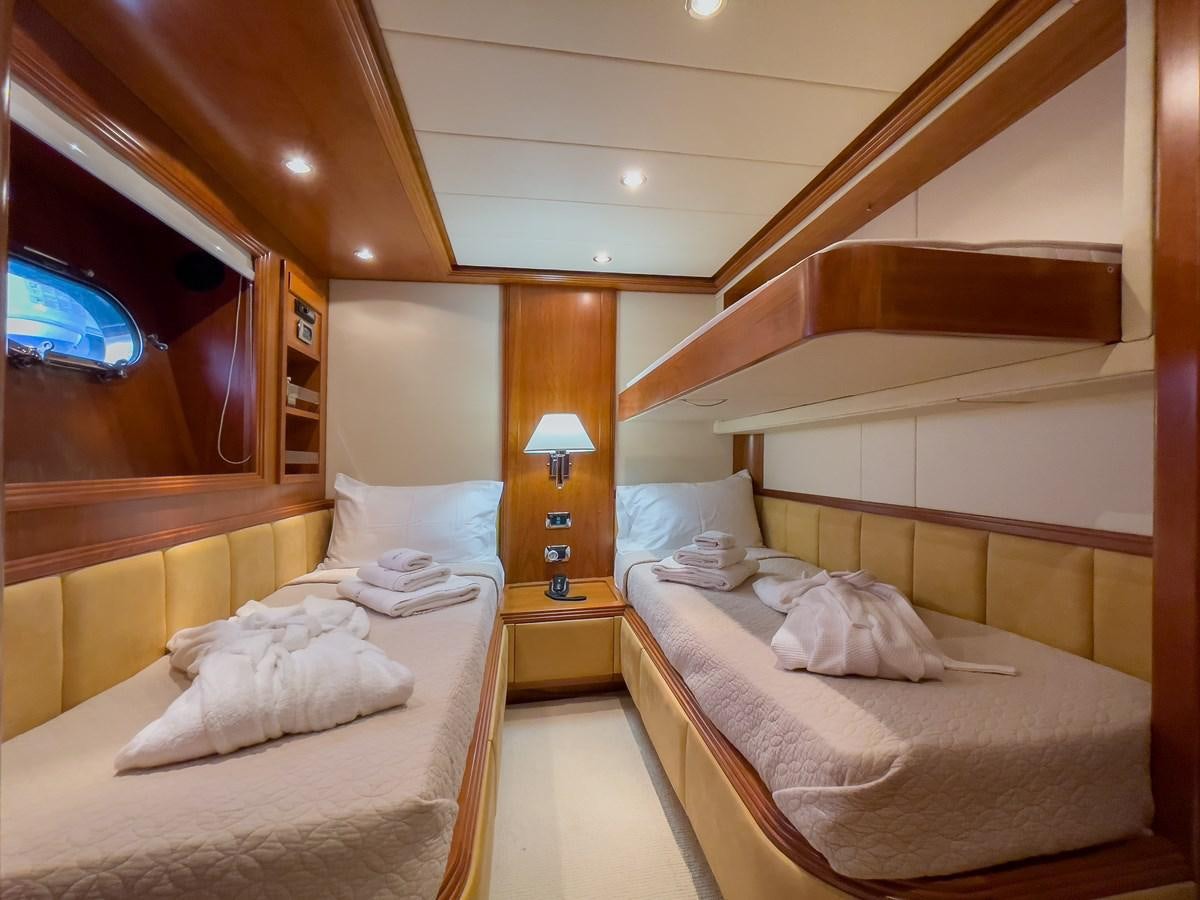 a room with two beds aboard SALTY Yacht for Sale