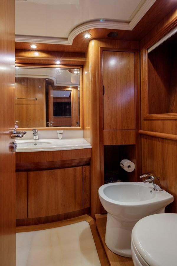 a bathroom with a sink and a toilet aboard SALTY Yacht for Sale