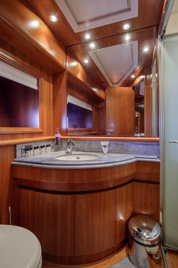 a bathroom with a sink and a toilet aboard SALTY Yacht for Sale