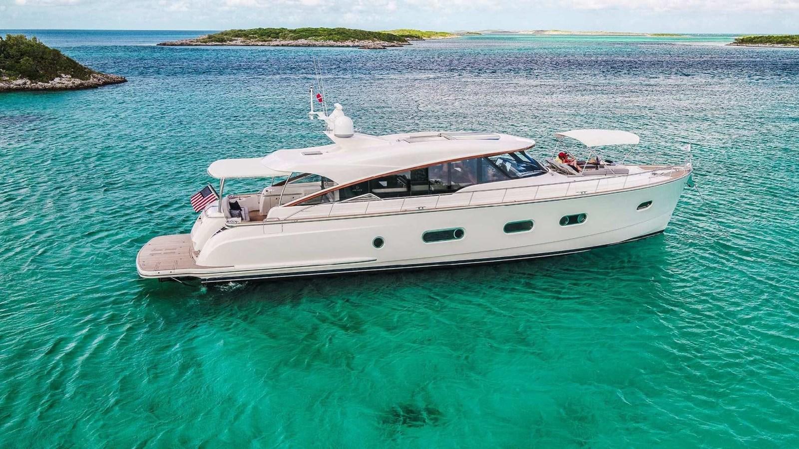 a white boat in the water aboard BELIZE 66 SEDAN Yacht for Sale