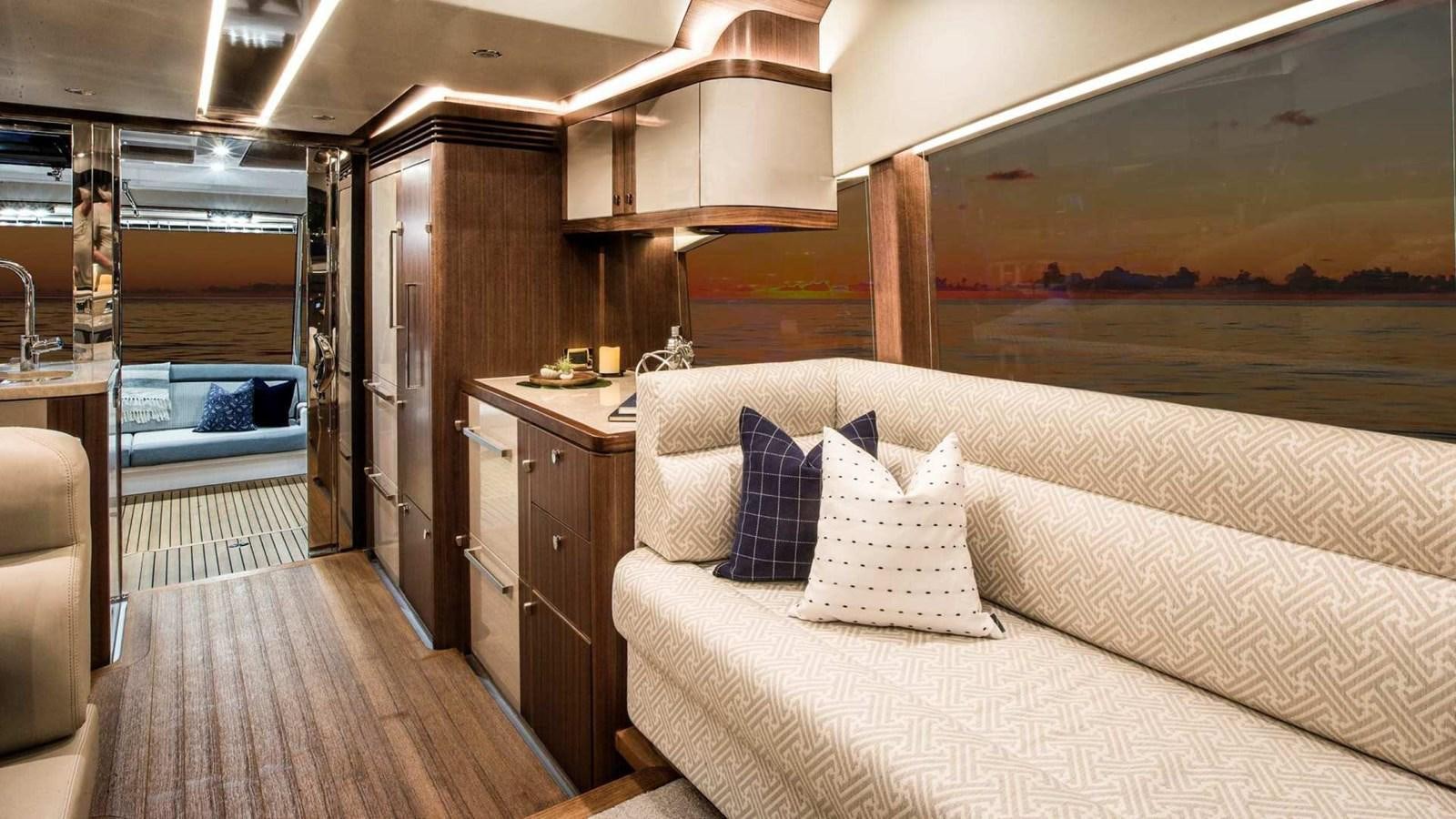 a bed in a room aboard BELIZE 66 SEDAN Yacht for Sale