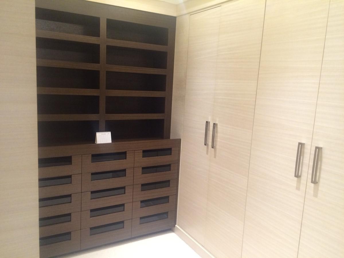 a room with cabinets and drawers aboard THE BIG BLUE Yacht for Sale