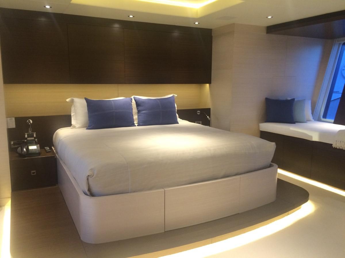 a bed in a room aboard THE BIG BLUE Yacht for Sale