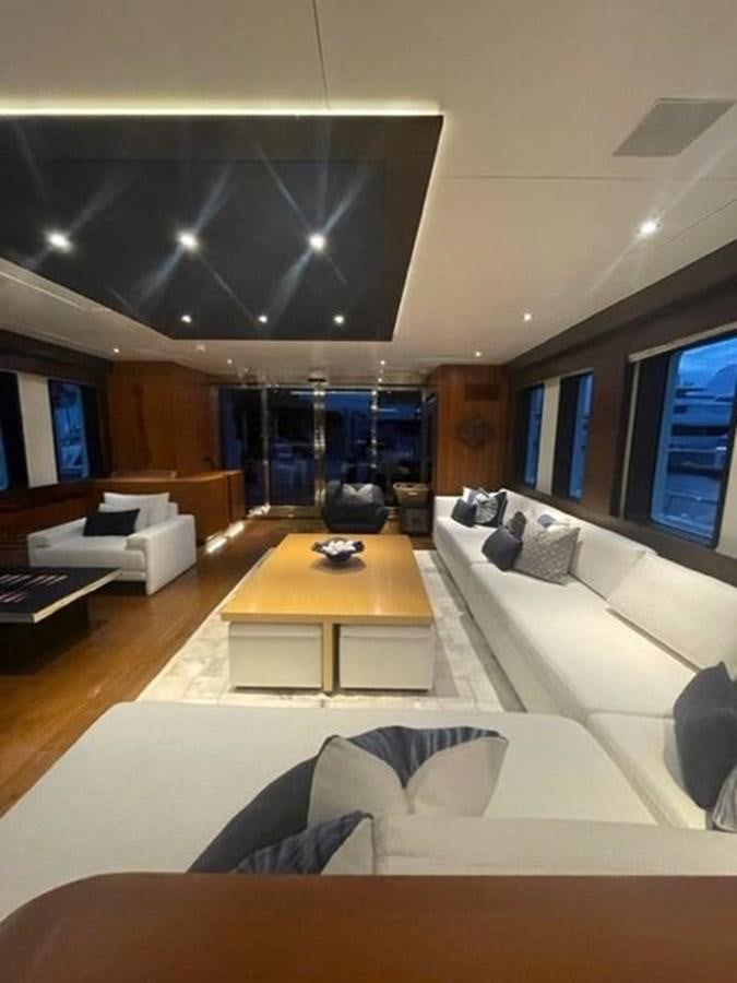 a modern looking living room aboard THE BIG BLUE Yacht for Sale