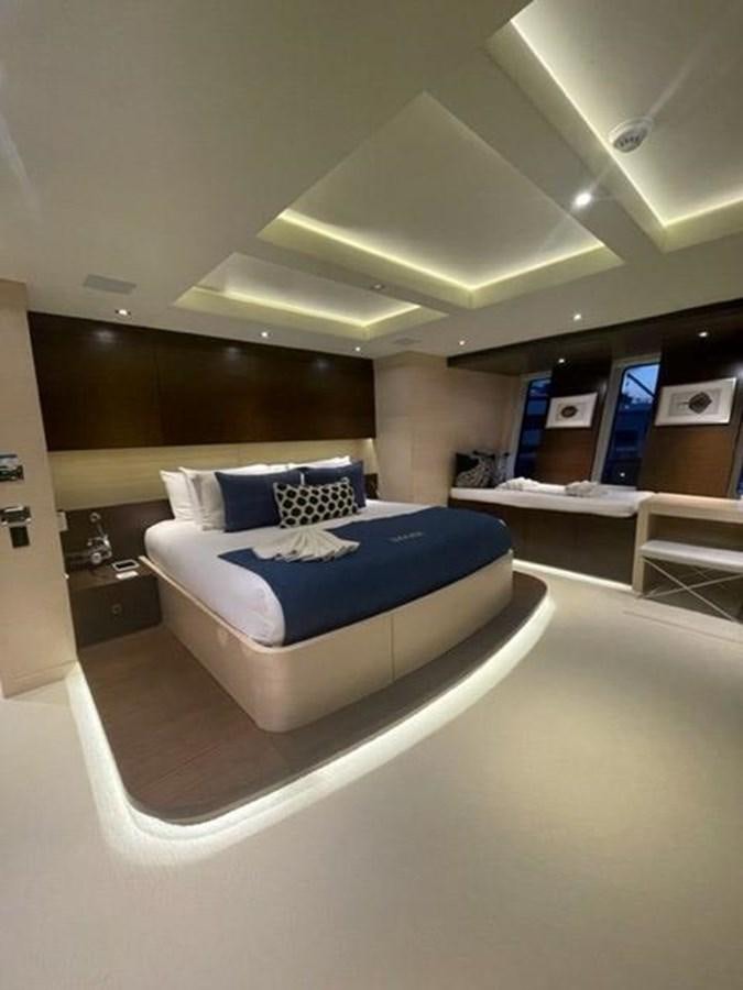 a bed in a room aboard THE BIG BLUE Yacht for Sale