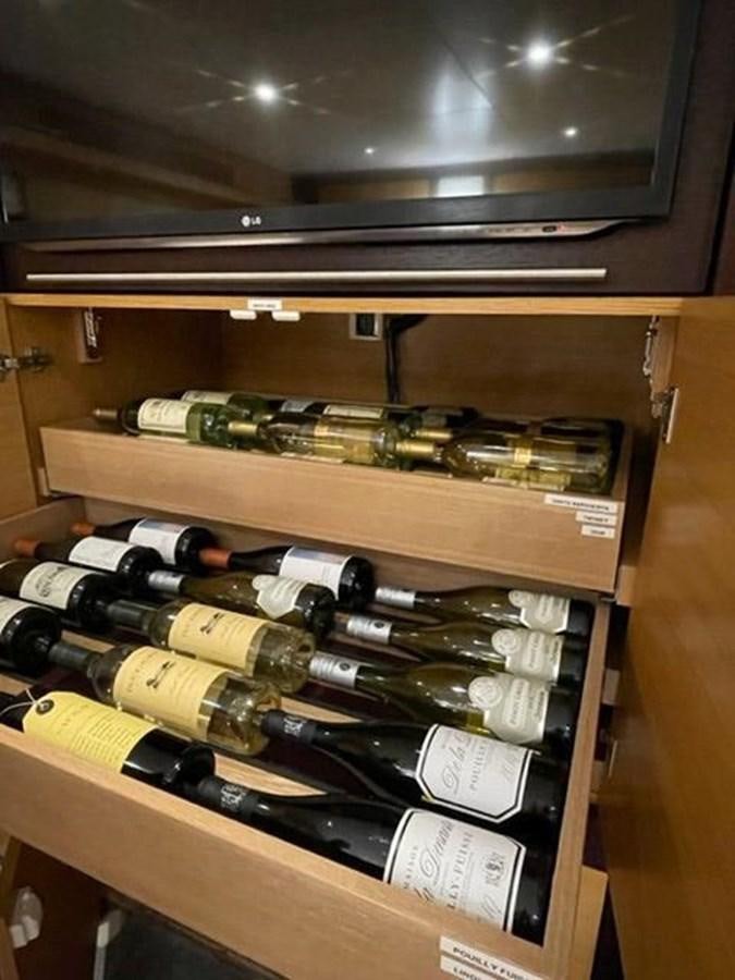 a shelf with various tools aboard THE BIG BLUE Yacht for Sale