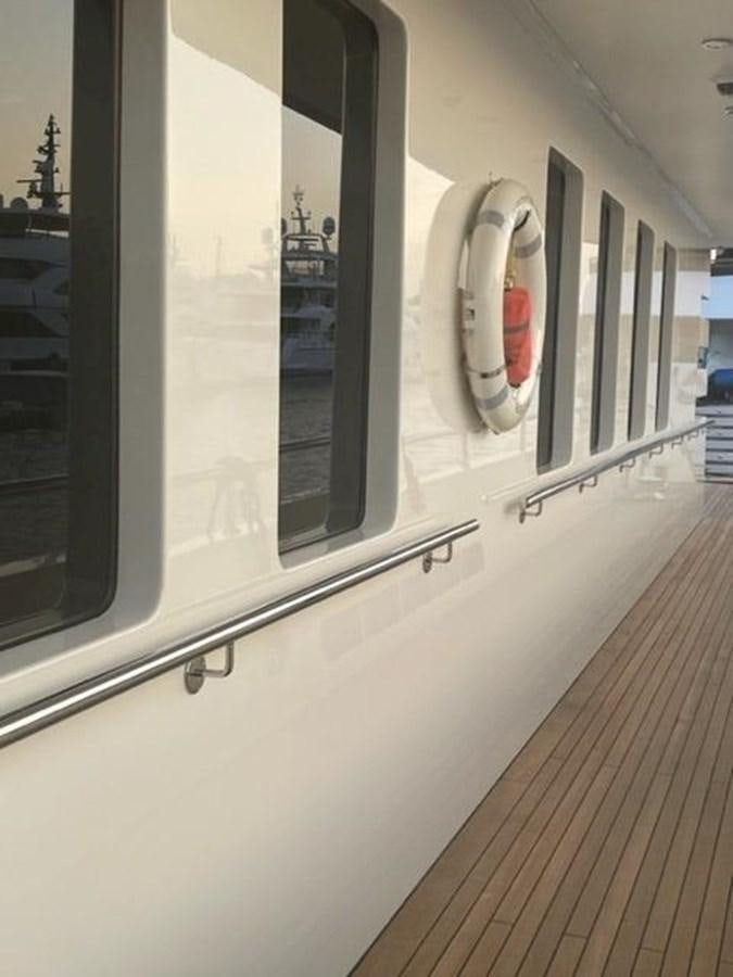 a white wall with a white wall and a white wall with a red light on it aboard THE BIG BLUE Yacht for Sale