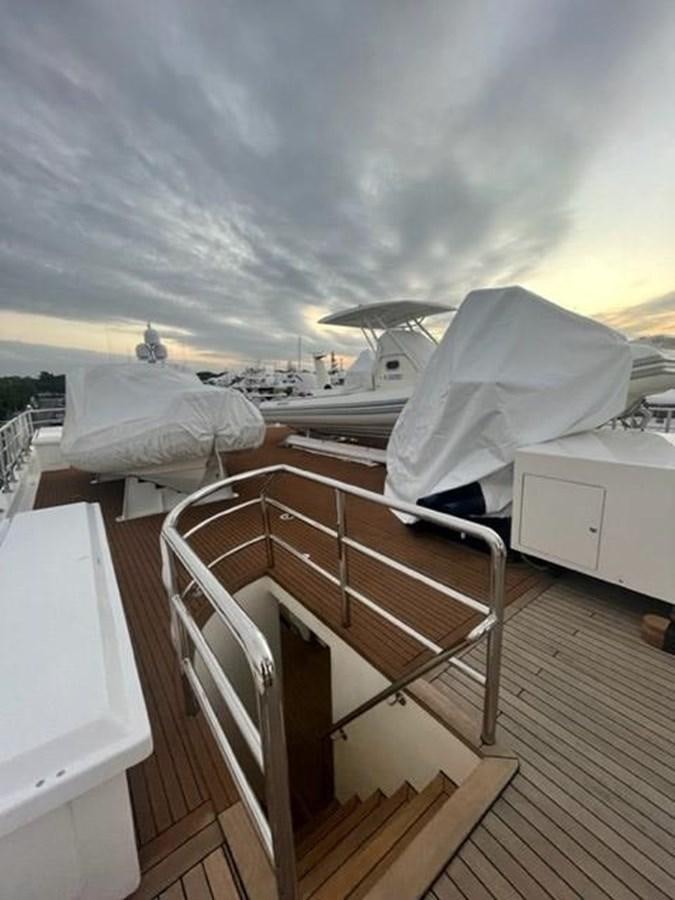 a deck with a large storm aboard THE BIG BLUE Yacht for Sale