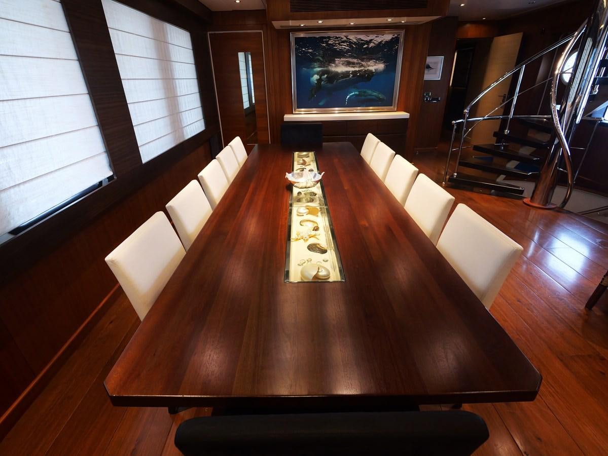 a wooden staircase in a building aboard THE BIG BLUE Yacht for Sale