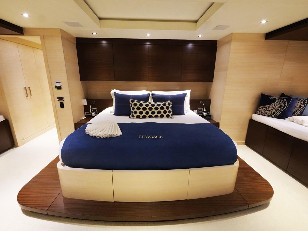 a bed in a room aboard THE BIG BLUE Yacht for Sale