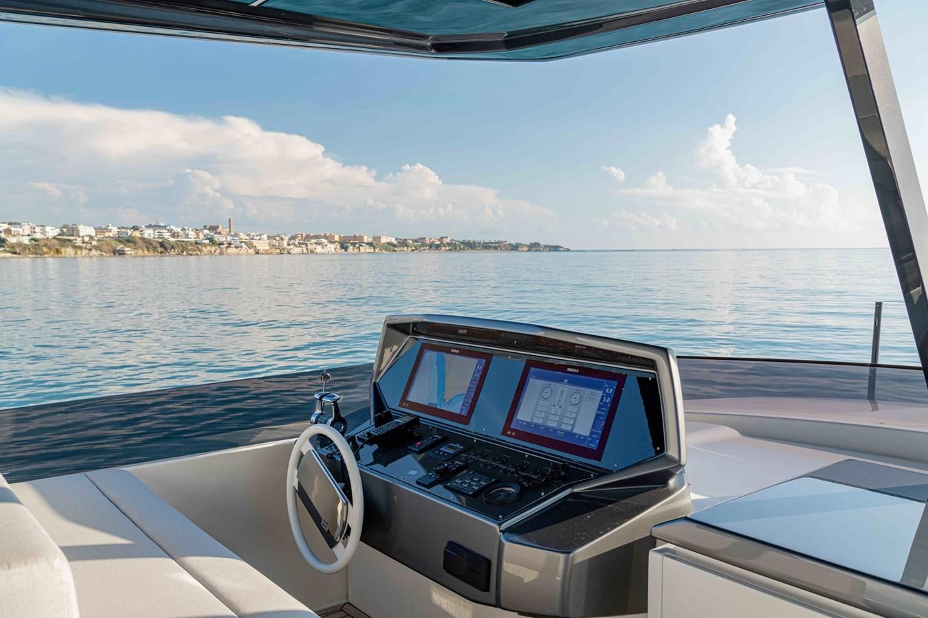 a laptop on a boat aboard YEMAJA Yacht for Sale