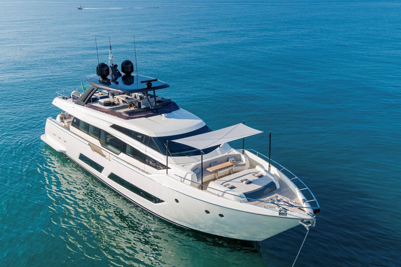 a white boat in the water aboard YEMAJA Yacht for Sale