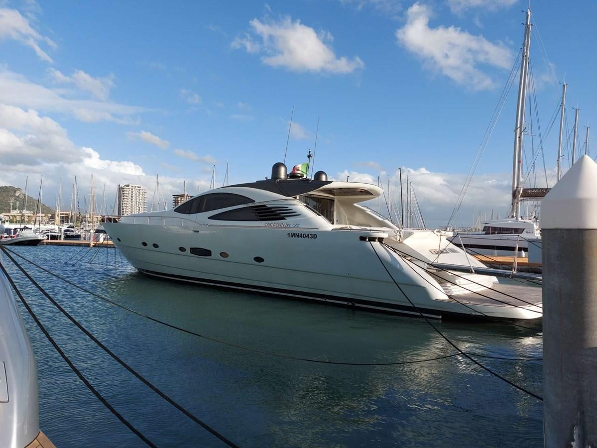 a boat docked at a pier aboard ONLY ONE Yacht for Sale