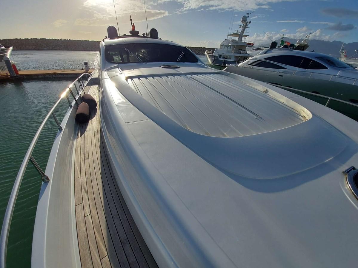 a group of boats on a dock aboard ONLY ONE Yacht for Sale