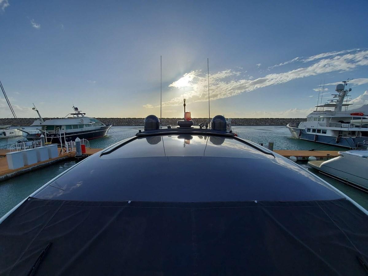 a large ship docked aboard ONLY ONE Yacht for Sale