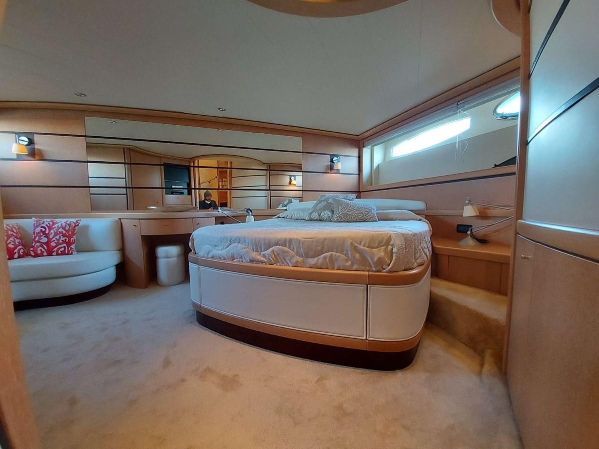 a bedroom with two beds aboard ONLY ONE Yacht for Sale