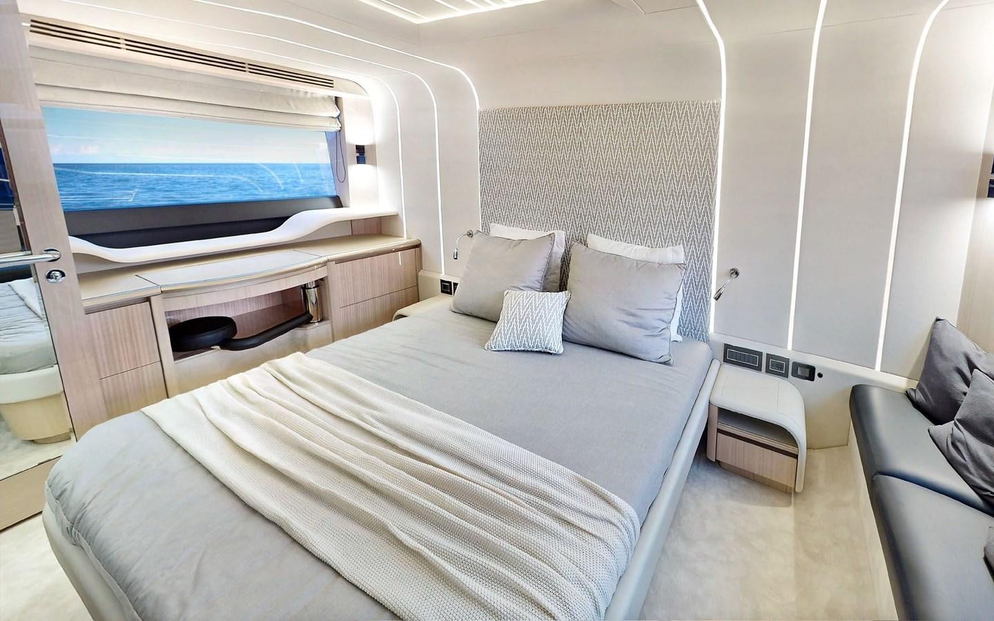a bed in a room aboard SERENITY Yacht for Sale