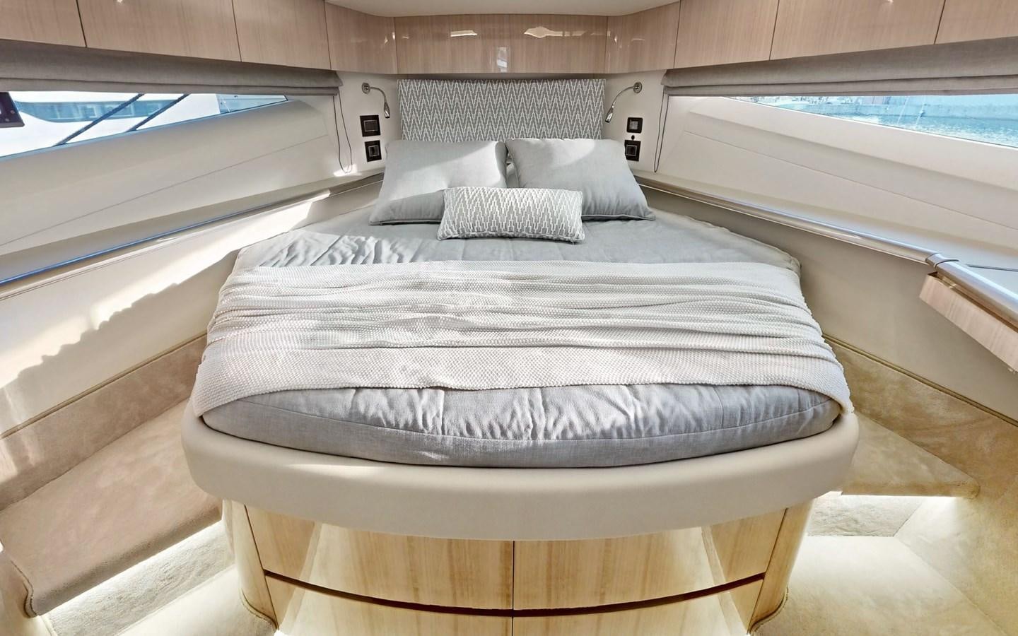 a bed in a room aboard SERENITY Yacht for Sale