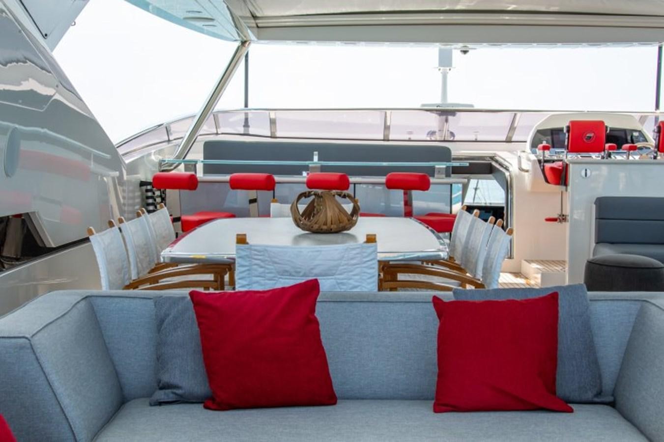 a boat with pillows and a table aboard SURVIVOR 2 Yacht for Sale