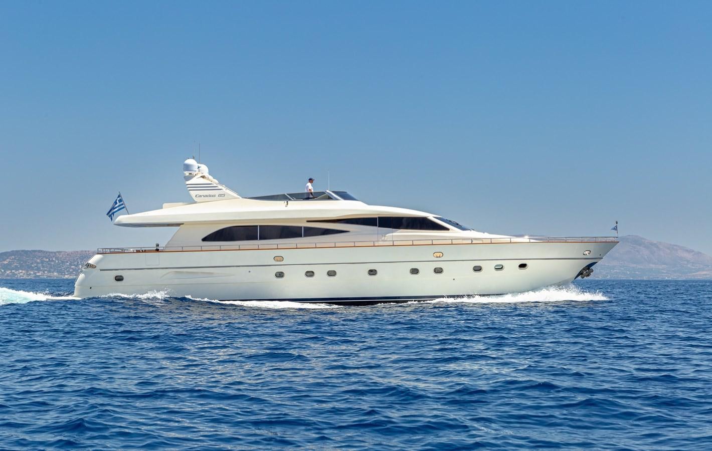 a white yacht in the water aboard VYNO Yacht for Sale