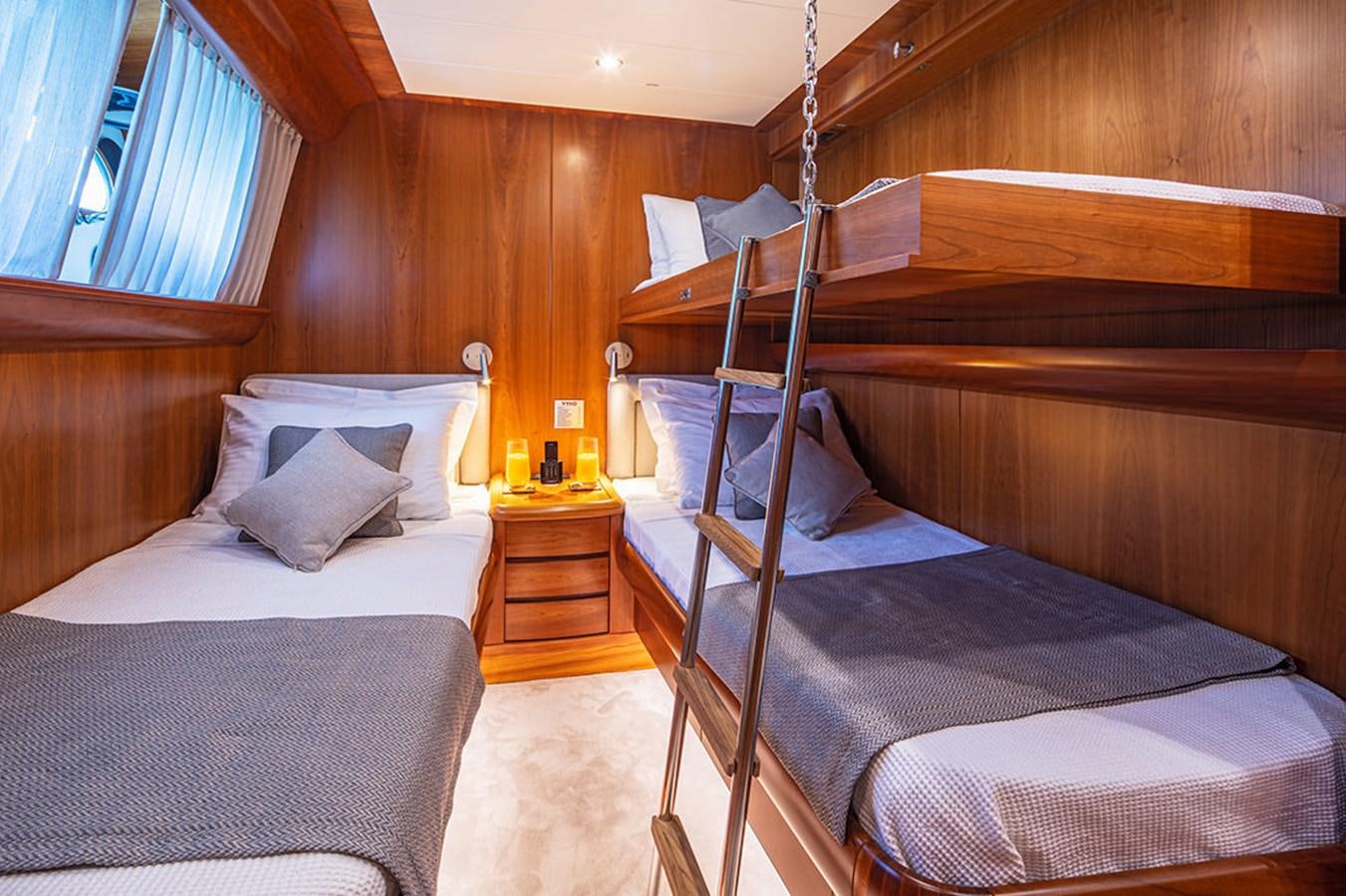 a couple of beds in a cabin aboard VYNO Yacht for Sale