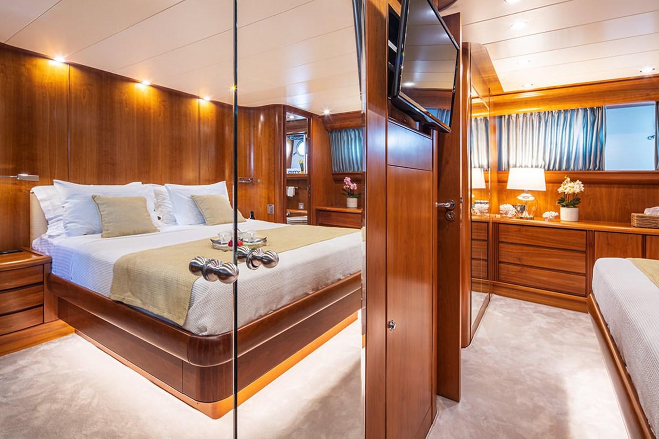 a bed in a room aboard VYNO Yacht for Sale