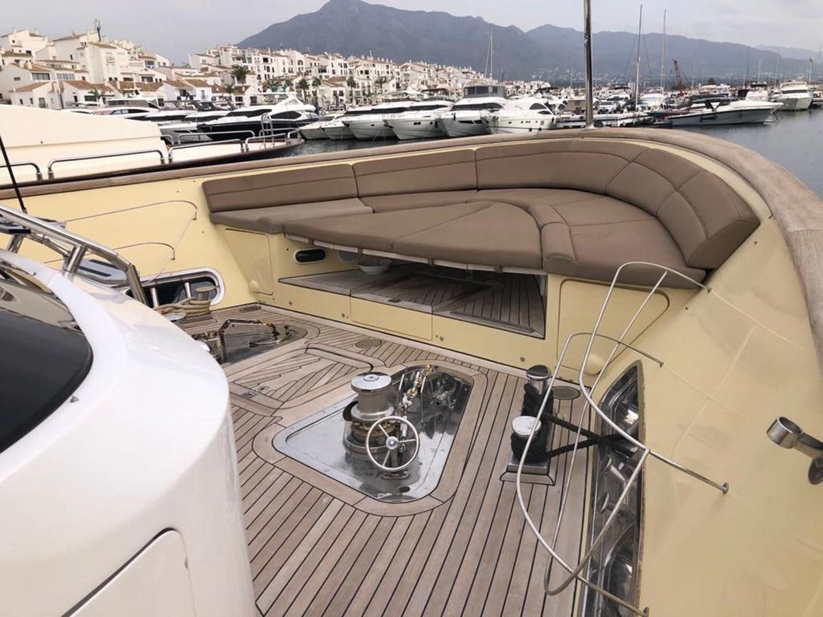 a boat docked at a pier aboard AKUA Yacht for Sale