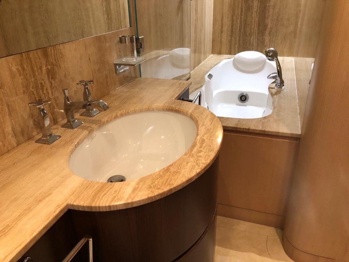 a sink with a faucet aboard AKUA Yacht for Sale