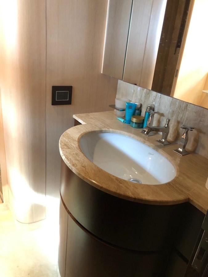 a sink in a bathroom aboard AKUA Yacht for Sale