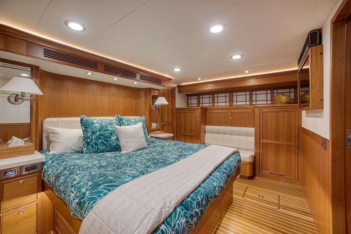 a bed in a room aboard QUIXOTIC Yacht for Sale