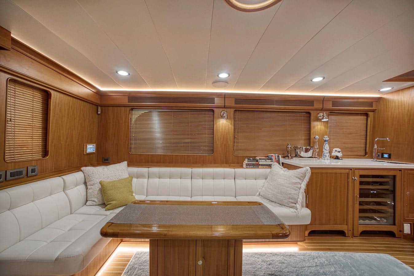 a large kitchen with a large island aboard QUIXOTIC Yacht for Sale