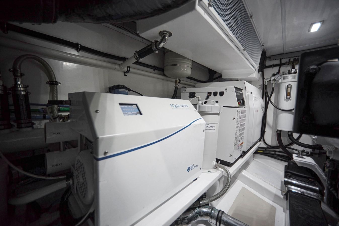 a machine in a room aboard QUIXOTIC Yacht for Sale