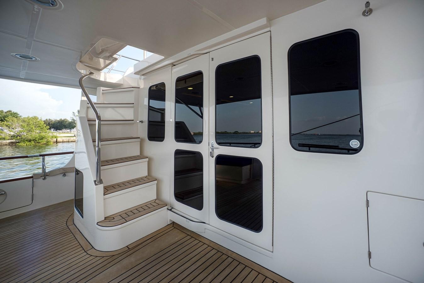 a white trailer with a door open aboard MAGIC Yacht for Sale