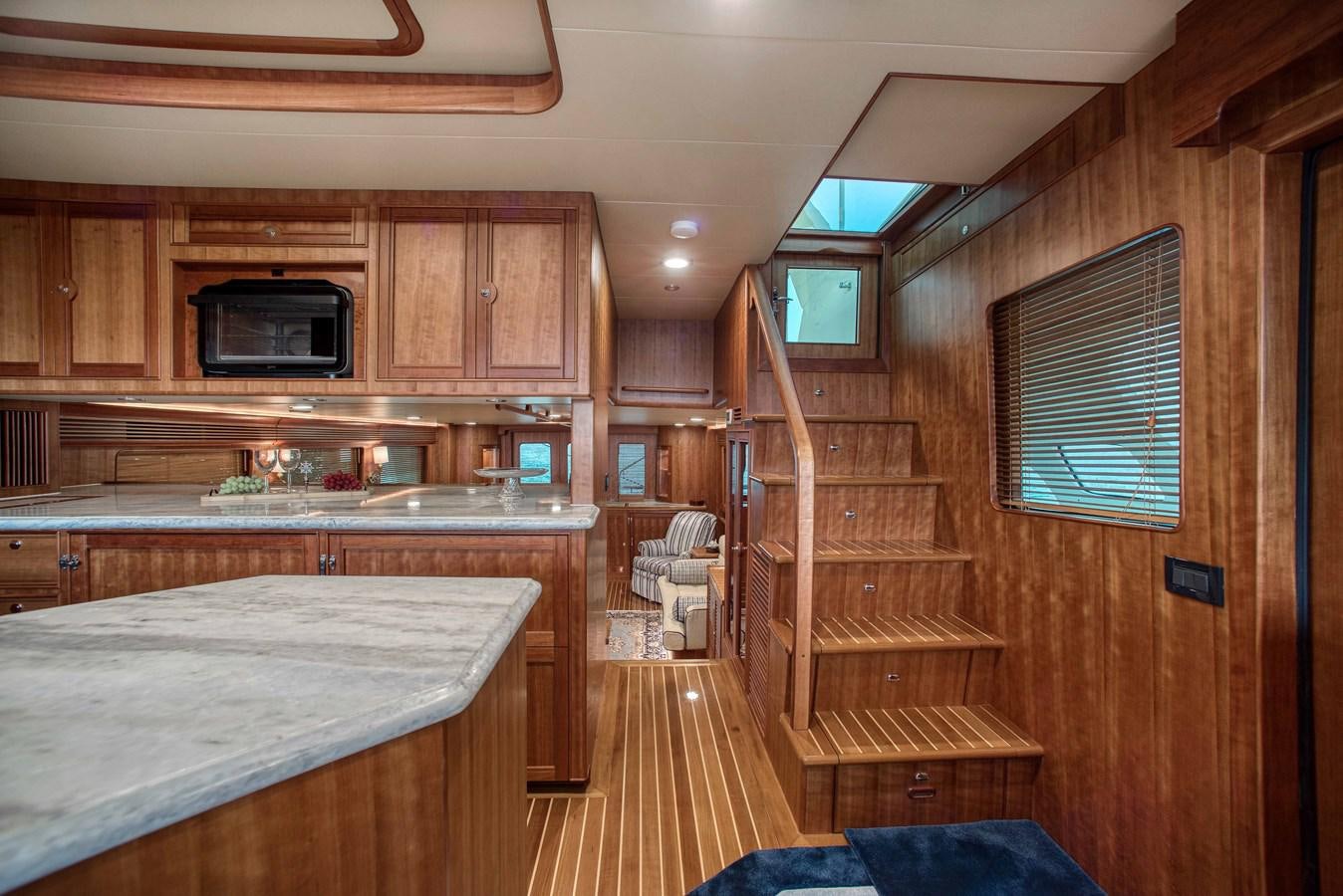 a wood cabin with a microwave oven aboard MAGIC Yacht for Sale
