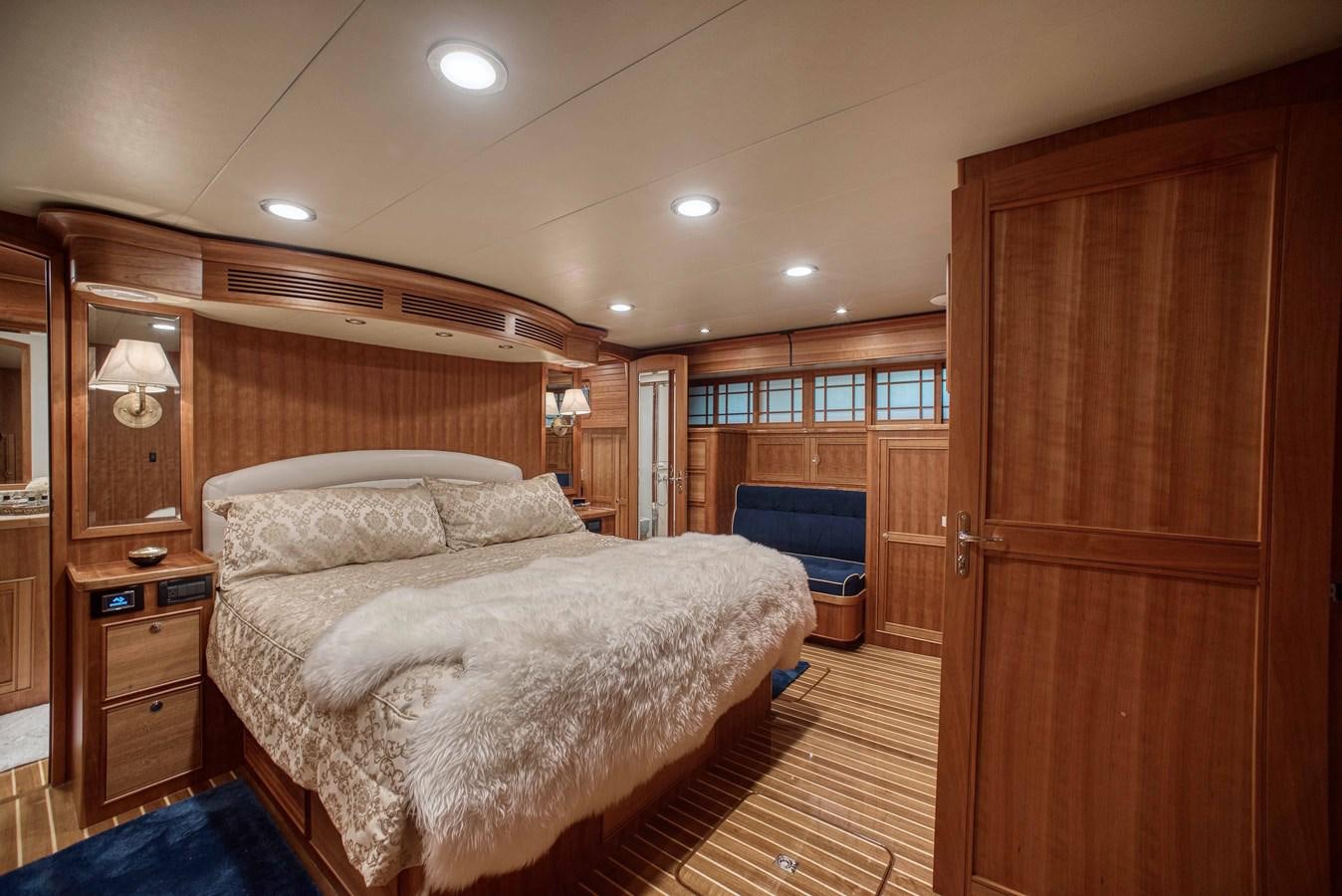 a bedroom with a large bed aboard MAGIC Yacht for Sale