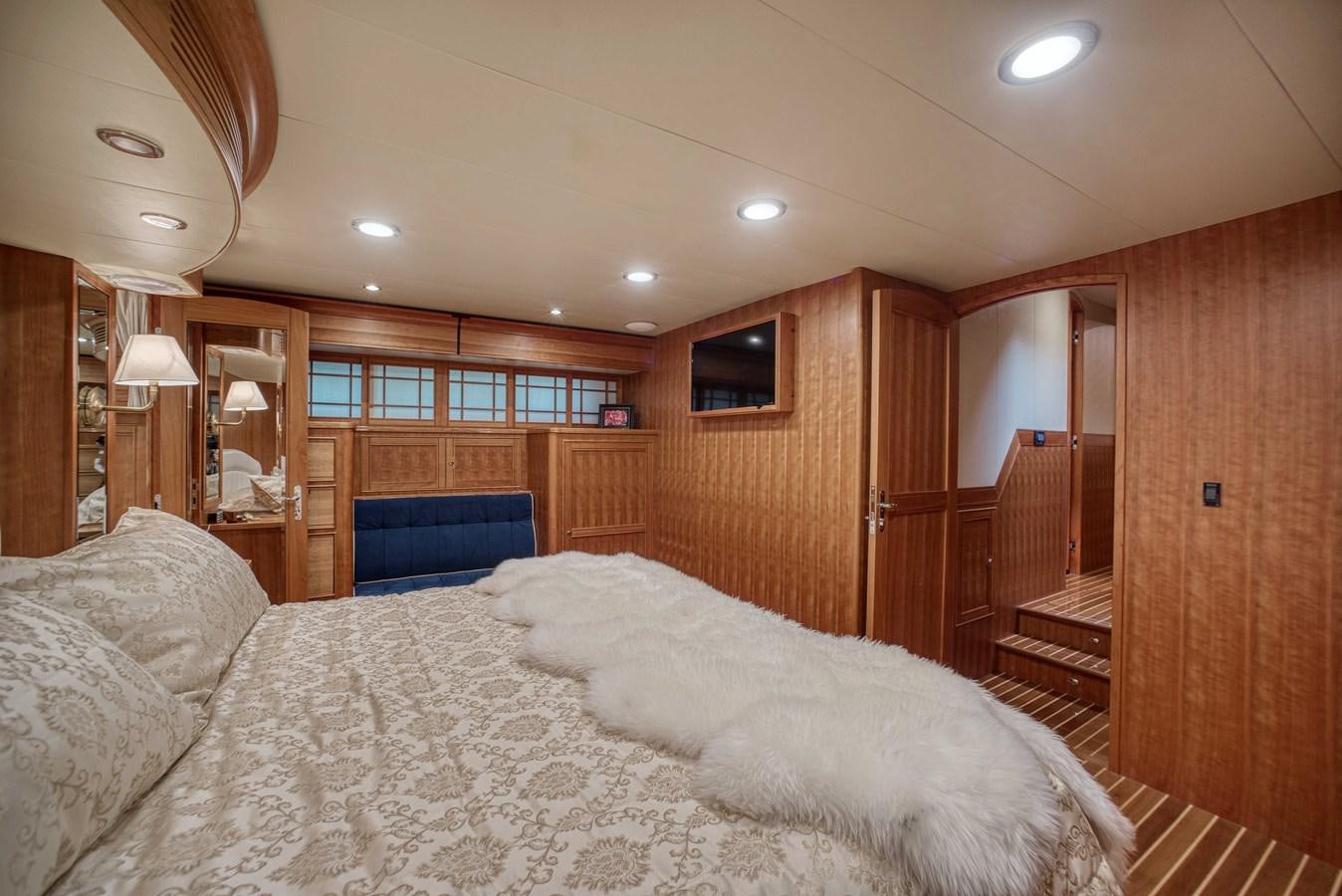 a large bed in a cabin aboard MAGIC Yacht for Sale