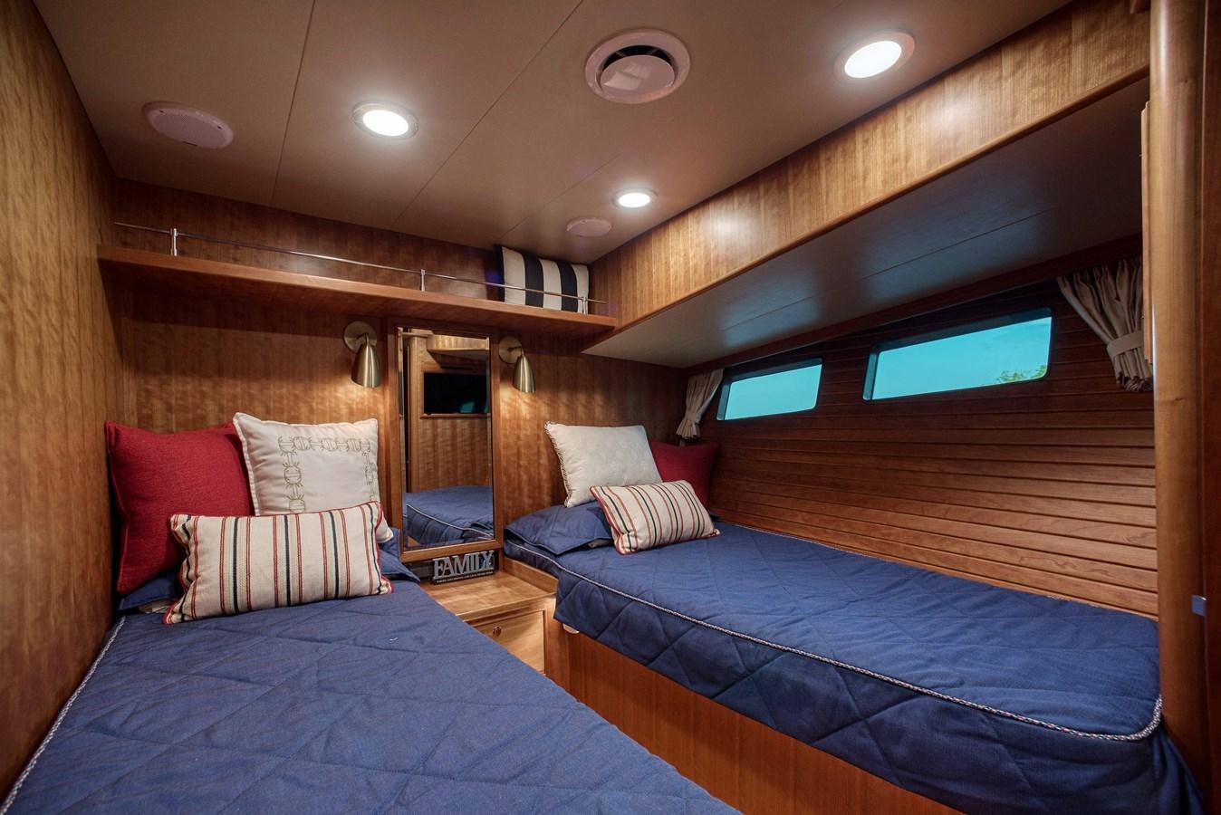 a room with two beds aboard MAGIC Yacht for Sale