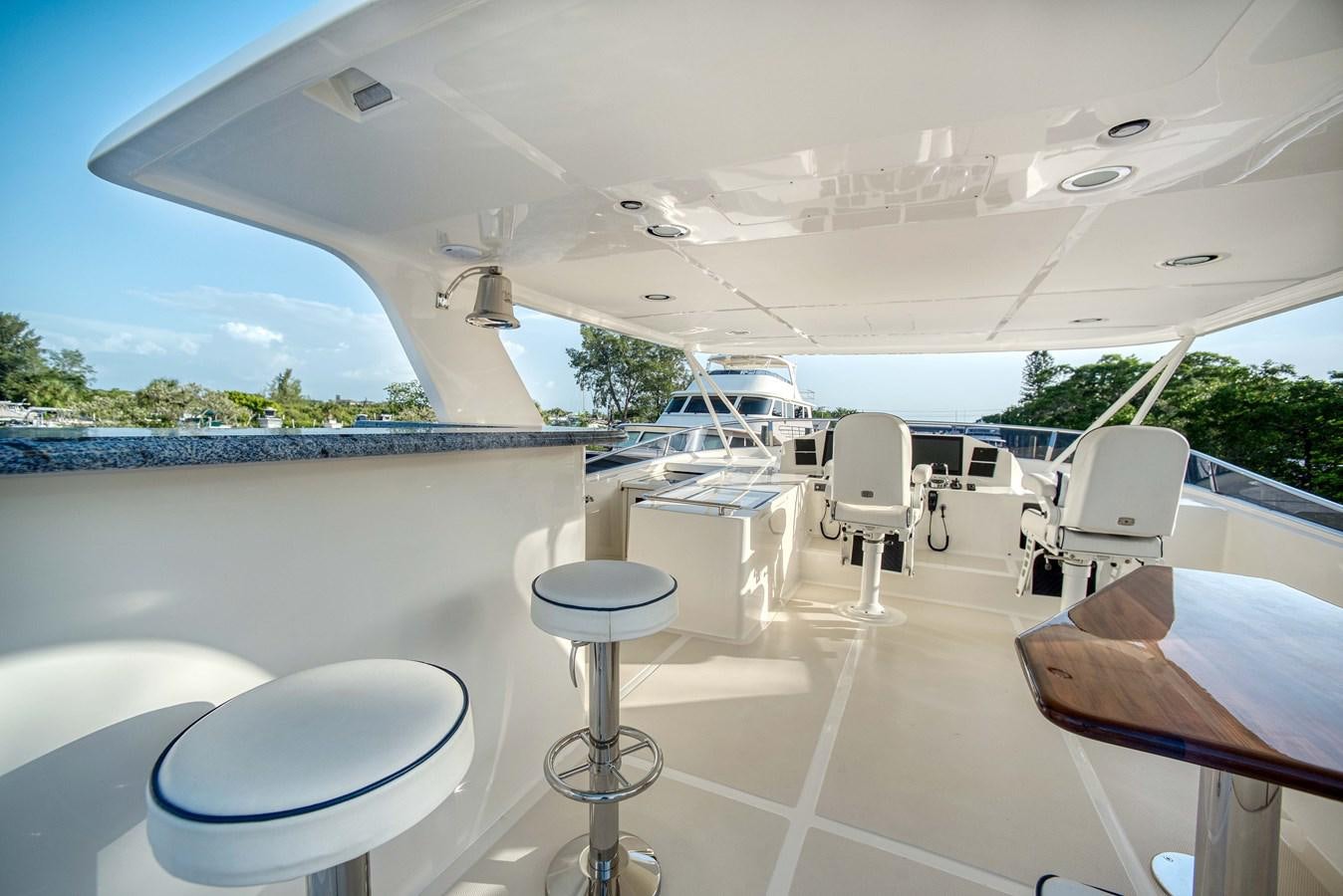 a room with chairs and tables aboard MAGIC Yacht for Sale