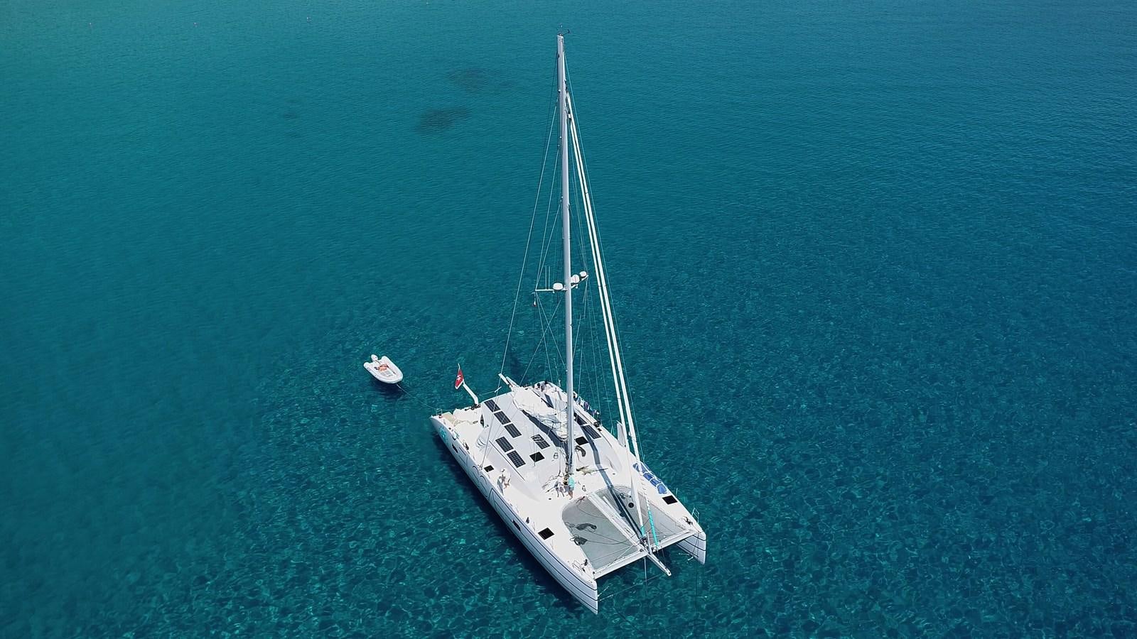 a boat sailing in the sea aboard ELSSA Yacht for Sale