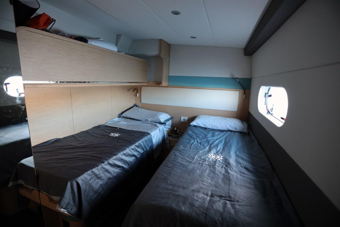 two beds in a room aboard ELSSA Yacht for Sale
