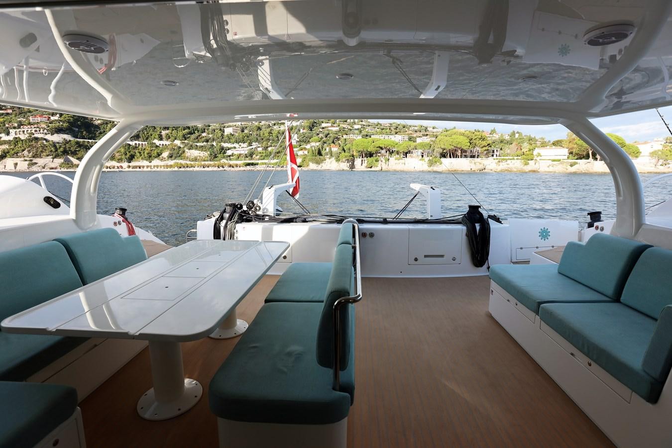 a boat with a deck and chairs aboard ELSSA Yacht for Sale