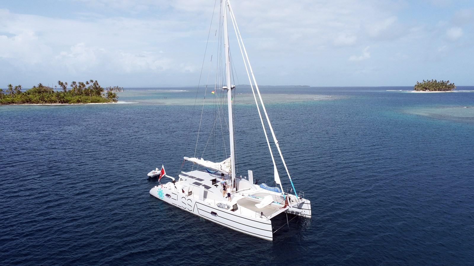a white boat on the water aboard ELSSA Yacht for Sale